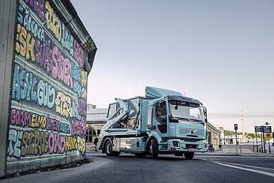 Volvo Truck crossing a busy street.
